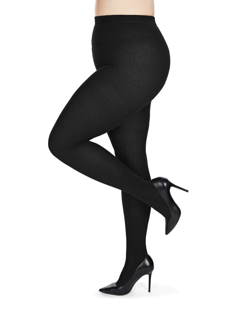 Side of a model wearing a size Q1-2 Boston Ribbed Cotton Blend Sweater Tights in Black by Memoi. | dia_product_style_image_id:299589